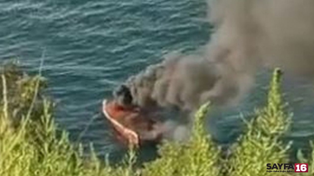 Balık tutmak isteyen baba oğul yanan tekneden son anda kurtuldu