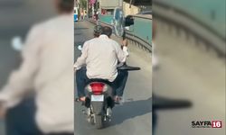 Bursa'da hayretlik görüntü!! Trafikte ilerleyen klimalı bisiklet