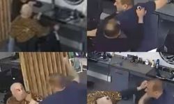 Berberde tıraş olan adama satırla saldırdı