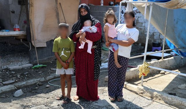 Ev alma hayaliyle kandırıldı, 5 çocuğuyla ahırda yaşamaya başladı