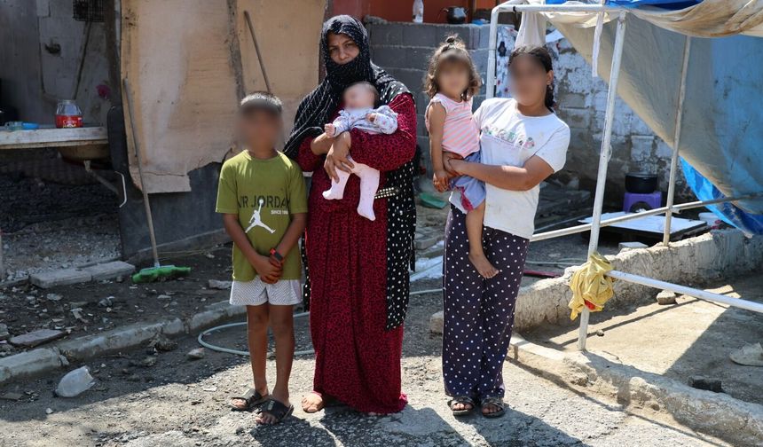 Ev alma hayaliyle kandırıldı, 5 çocuğuyla ahırda yaşamaya başladı